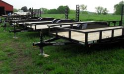 Lone Wolf Trailer 83" x 16' $1,980
Frame - 3 x 4 x 1/4 Angle
Top Rail and Uprights - 2 x 2 Square Tubing
Tongue - 4" Channel, Wrapped
Heavy Duty Checker Plate Fenders w/ Steps
Dexter 3500# EZ Lube Axles with 1 Brake
New 205/75 15" Tires
Treated Pine