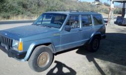 Jeep Cherokee 4.0 HOP engine 4dr Rwd. Dose have 200Â± thousand miles. But runs strong as ever and gets great MPG. $2,000 OBO. --
