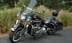 Always garaged HD Road King.&nbsp; Leather bags, detachable winshief, has full 95th anniversary cover.&nbsp;