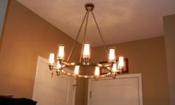 MUST GO! Brushed nickel, clear glass 9 cylinder hanging light with satin etched center. Paid $860 for it. Yours for $400 O.B.O
For a better picture of what it looks like together and hanging, google Kichler lighting. 2346 NI is the style of light, you