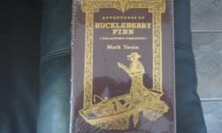 &nbsp;&nbsp;&nbsp;&nbsp;&nbsp;&nbsp;&nbsp;&nbsp;&nbsp;&nbsp;&nbsp;&nbsp;&nbsp;&nbsp;&nbsp;&nbsp;&nbsp; This is a Sealed Adventures of Huckleberry Finn (Tom Sawyer's Companion) Hardcover with Gold-Leafed (Edged) Pages. By Mark Twain.