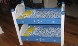 These beds are hand made of 3/4" pine, very well built. They come painted to match the bedding set, which includes a mattress pad, coverlet, and pillow. Call today to come see them, little girls and big girls love them. Grandma's love them to have for