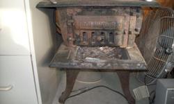 4 burner with oven wood burning cast iron stove and railroad lantern both $500.00; call for appointment 513-421-3015