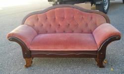 Antique childs sofa in rose color. Used only for display purpose.