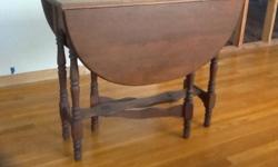 Antique drop leaf table with scissor legs. Passed down through family. Great condition. Excellent Christmas gift for the "antique collector".