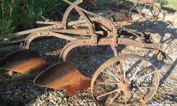 Antique plows, yard art $250 ea Call -- --