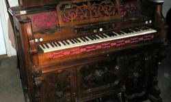 Here is a pump organ in a &nbsp;beautiful walnut case that dates back to 1870. All keys have been restored with new leather felt pads and there are new&nbsp;leather felt pads on other places of contact. There are 72 keys and 6 stops. Notice the folding