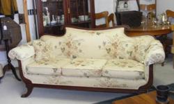 THIS IS A REAL NICE SOFA.THE WOOD HAS NEVER BEEN REFINISHED.IT HAS BEEN REAPOLSTERD TO FIT THE PERIOD OF TIME.VERY SOLID AND SITS GREAT.SEE THIS PIECE AT ANTIQUES AND MORE.931-456-0908.NO E-MAIL PLEASE ASK FOR DEXTER MCGREW. NOTE. 6-3-11 THIS WEEKEND