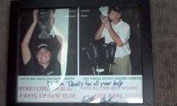 Framed photo of the 2003 RE/MAX World Long Drive Champion Nancy Abiecunas and the 2003 Pinnacle Distance Challenge Champion Nathan Nicks. This photo is autographed by Nathan Nicks. Golf Collectors/Fans contact us through this posting or call us at .