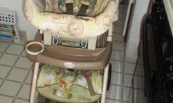 WINNIE THE POOH STROLLER AND CAR SEAT.