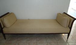 &nbsp;&nbsp;&nbsp; Formal backless sofa for sale.&nbsp; Perfect for sitting/living room.&nbsp; Has been in the family many years.&nbsp; Must see to appreciate.&nbsp; Approximately eight feet long, real wood. and cloth upholstery.&nbsp; Comes