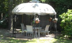 backyard gazebo have it 4 years it is big you will have to take it down it is screwed into wood