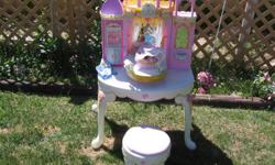 This is a Barbie Doll house or Princess Doll house made an a vanity. The bed Folds up and there is a drawer for all the Little princess things and a mirror for her to do her hair or play dress up. Or the mirror comes down and its a Barbie or Doll Bed. Has