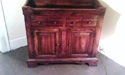 This is a solid cherry baby changing dresser, built with superb craftsmanship. It has 2 drawers and 2 full shelves underneath. This piece is in great condition it was built by
" sears open hearth collection" in the 70s. It has the stamp inside the drawer.