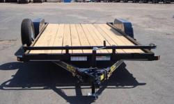 Big Tex Car Hauler Trailer GVWR for 7,000 lbs with the payload capacity of 4,980 lbs, trailer has two 3,500 lbs axles, 83 inches between the fenders and 16ft long with electric brakes on one axle, standard breakaway kit, spare tire and wheel mounted on