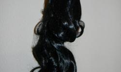 It's a beautiful hairpiece. Black, wave. $40