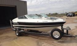 1993 Mariah 18 ft. inboard/outboard in good condition. Black & White, interior in good condition. Kept in Garage, Recent tires on trailer.