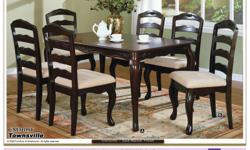 Brand new dining set, still in the boxes. The table is 60" x 36" x 30" high. It is dark walnut with carved appliqued apron and cabriole legs. It comes with 4 chairs to match. Beautiful set. Never used.