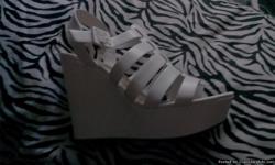 Never worn white wedge open toe sandals from ShIeKh Shoes in the antelope mall size 10