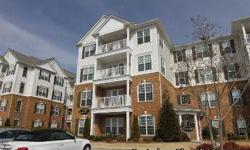 Beautiful 2 bedroom condo with office in desirable Ballantyne area! Rich hardwoods throughout. Living room is open to kitchen that is bright with white cabinets and a bar area. This is a must-see for anyone interested in being within walking distance to