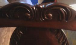 Beautiful Brown Chair with fancy carvings. $50.00 O.B.O