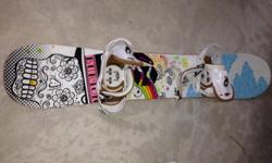 Burton Gtwin. Women's twin tip board. 148. Good condition and lightly used minus small rock chip on one of the edges. Cute design. Comes with Lexa bindings that have toe strap. Original value of board plus bindings was around $500.