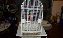Bird Cage with 2 ceramic dishes, also the seed gaurds on all 4 sides, doesnt take up a lot of room perfect for cockatiel or smaller we used it for Indian Ring Neck
&nbsp;