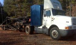 1996 International tractor w/sleeper with a 5 car hauler (trailer). Located in Winder Georgia. call Al @ 713-868-9500