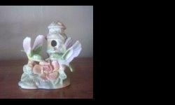 Three darling ceramic hummingbird with birdhouse or mailbox figurines.