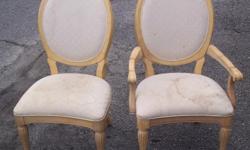 Two sturdy wood&nbsp;chairs, one with arms and one without....both need to be reupholstered.&nbsp; Take both for one price!!