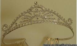 Classic Princess Tiara
Gorgeous tiara accented with high quality crystals in a beautiful silver plated setting.