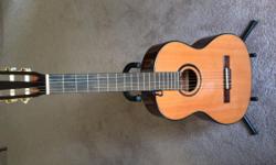 Ibanez 6 string classical guitar, with guitar stand, purchased new 6 months ago