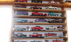 They are scale 18 diecast. There are 1930,1940,1950,and some 1960's. Buick,Chevrolet,Fords,and Chrysler. Approximately 100 collectable vehicles,(Most boxes are included). Not sold as individuals they are being sold as a set.