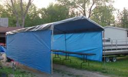 Used Commerical type tent about 10X 20 in shze and has full heavy duty galvanized frame, side curtains, end cap curtains, anchoring stakes and tie downs.&nbsp; All in good condition.&nbsp; I also have extra tarp ties and the storage container for the