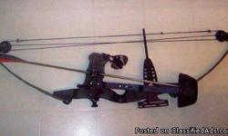 Camouflaged compound bow., weight is 65 lbs. and 28" draw length.
Good condition.
