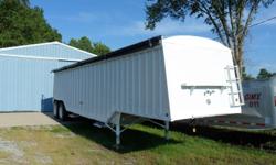 1978 Cornhuskers 38ft. Grain Hopper trailer, new rollover tarp, new white paint, 24.5LP tires on white steel budd wheels, spring ride and good brakes. (618) 924-3426 (Cell)