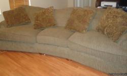 Large Brown Sofa in good condition w/ pillows. Great for family room or any room of the house- Very Comfy! 110" x 48" approx arm rest to arm rest. Call 407-491.2212 w/ any questions.