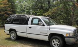 1997 Dodge Ram. 129k miles. 2WD, White w/ gray interior. Black Excalibur camper shell, bed liner. Body perfect, interior very good. Kept under roof.