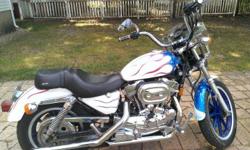 Springfield, IL: $3500 obo for a 1995 Sportster 883 with low miles, around 13,000. New custom paint on rims and bike in July of 2013. Extras include saddle bags, forward controls, quick release windshield and sissy bar. Pictures don't do justice to the