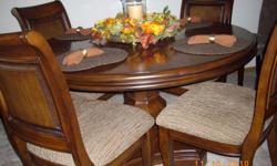 54 inch Round pedistal table, 4 chairs, buffet is 56 in. long, 35 in. tall. Three years old. Call -- before 8pm