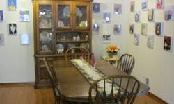 Diningroom Furniture-----very large table with leaves, 4 chairs and 2 arm chairs. All chairs with cussions. Hutch wood and glass with light inside. All pieces solid wood. Valued at Pennys $2543. My price $800 732-222-0317