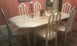 Beautiful Dining Room Set for Six
Cream Color with Polished Stone type finish.
Table has some water damage at the base that can be fairly easily be repaired.
Excellent deal for a do-it-yourselfer