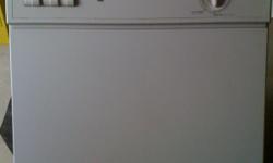 General Electric built-in dishwasher. It is a bisque color and in excellent condition.