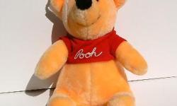 Winnie the Pooh is 10" high and has his tags from Disneyland.&nbsp; Looks new.&nbsp; Would delight any child.