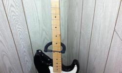 For sale is a very nice electric guitar, with amp, music stand, strap, and chord buddy learning system with over 100 songs. see pics, great deal, thanks for looking.