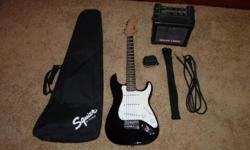 Squire by Fender mini
amp Roland Micro Cube
with accessories