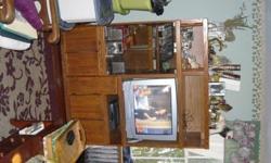 (Overall dimensions...55'' wide, 66'' high, 21''deep).....TV opening (29'' wide, 24''high).....Glass Doors on left for stereo (21'' wide, 31'' high)...two bottom cabinets, pull-out cabinet for vcr tapes....two top openings for knick/knacks, two accordian