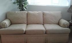 Hello; I have a seven foot Ethan Allen sofa for sale. The seat slip covers are removeable. The cusions are surronded with down. I chose the design fabric. It is easily cleanable. It was in our formal living area and is nolonger needed. I must warn you,