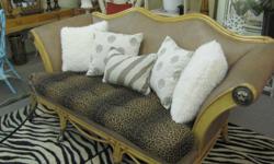 Wicker and rattan curve back sofa with Versace lions head accents on arms and metal ball and claw feet. Great piece for any Florida room.
Search DecoratorFinds for more items for sale, like us on Facebook at http://www.facebook.com/DecoratorFinds.net or