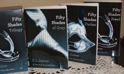 Set of all three "Fifty Shades" novels by EL James still in original holder. Excellent condition.
See pictures below.